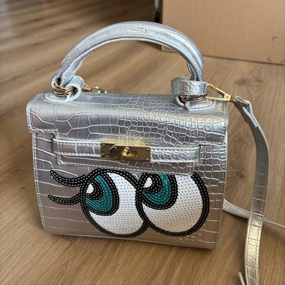 Silver Croc-Embossed Top Handle Novelty Bag with Cartoon Eyes and Gold Hardware - Picture 1 of 6